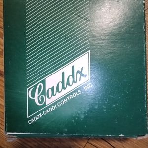 Caddx caddie controls inc. intruder alarm.